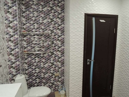 Отделка ванной комнаты плиткой в Островце